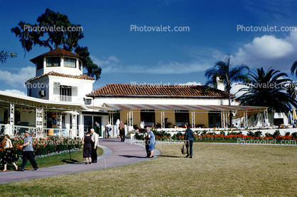 Building, lawn, People, path, Palm Trees