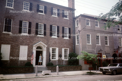 Brick building, Bonneville Car, sidewalk, Charleston, May 1969, 1960s