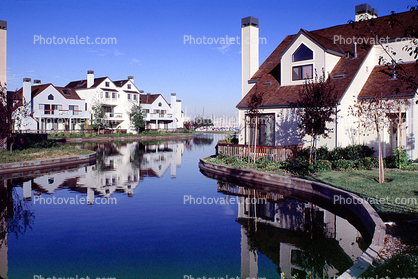 Homes, water, reflection
