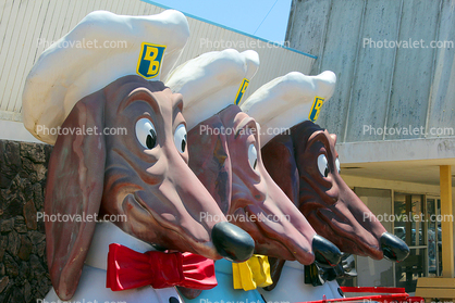 Chef, Hat, bowtie, Doggie Diner dachshund sculptures, wiener dog