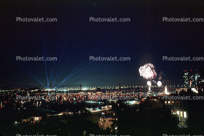 Kleig Lights, spotlights, Boats, buildings, the Embarcadero, 50th anniversary party celebration for the Bay Bridge