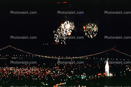 Fireworks, Boats, piers, string of pearls, the Embarcadero, 50th anniversary party celebration for the Bay Bridge