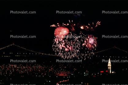 Fireworks, Boats, piers, string of pearls, the Embarcadero, 50th anniversary party celebration for the Bay Bridge