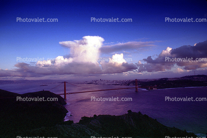 Golden Gate Bridge under a rain cloud