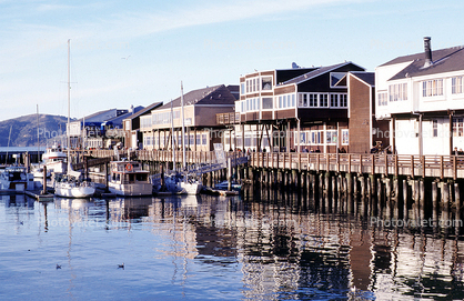 Docks, boats, calm water, buildings, shops, Pier-39