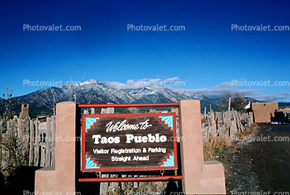 Welcome to Taos Pueblo signage, Sangre De Cristo Mountain Range