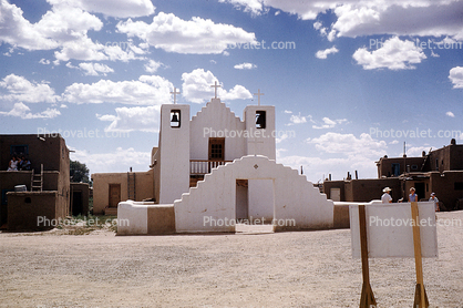 San Geromimo Chapel, small building, Church, Christian, Cross, two bell towers, Clouds, Religion, Religious, Building, exterior, outside, outdoors, Taos Pueblo, New Mexico