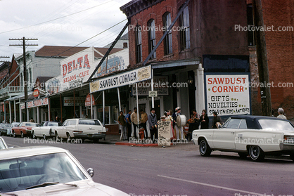 Sawdust Corner, downtown, cars, shops, buildings, Virginia City, 1960s