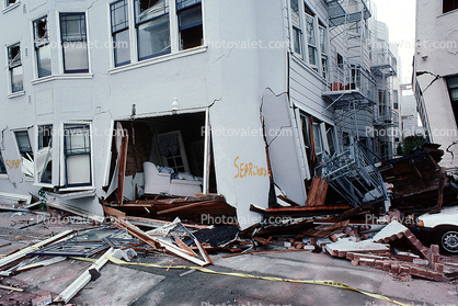 Sidewalk in Upheaval, Garage Doors, Fillmore Street, Marina district, Loma Prieta Earthquake (1989), 1980s