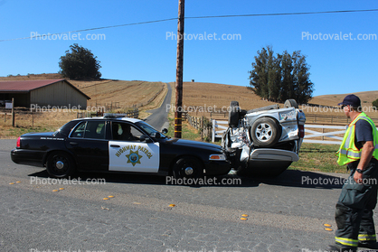 California Highway Patrol pushing and overturned car off the road, CHP, Sonoma County