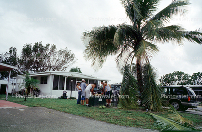 downed trees, trailer home, people, Hurricane Francis, 2004
