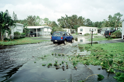 downed trees, building, trailer homes, SUV, flood, flooding, house, Hurricane Francis, 2004