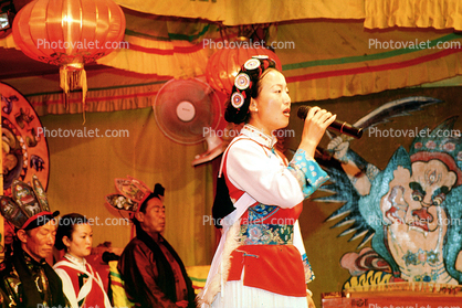 Woman Singing, Singer, paper lamps, sword, Naxi Musicians, Lijiang, China