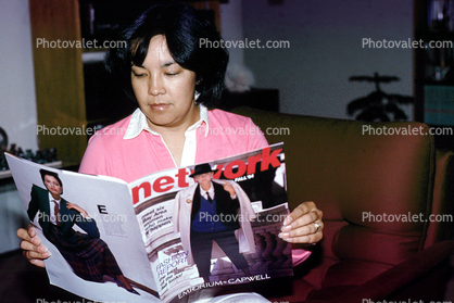 Woman Reading the Network Magazine
