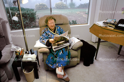 Woman reading the morning newspaper