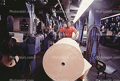 Paper rolls, Printing Press, worker