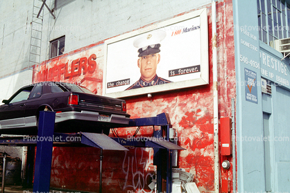 Marine Corps billboard, car