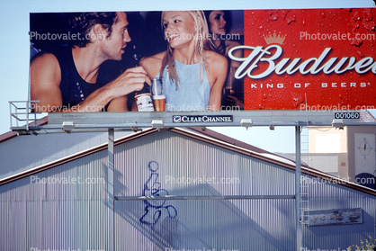 Budweiser Beer billboard, man, woman