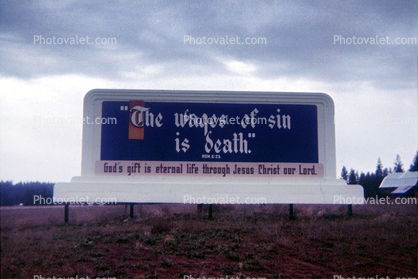 "The Wages of sin is death.", religious billboard, November 1969