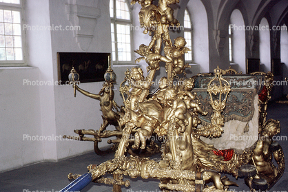 Ornate sled, gilded gold, opulant