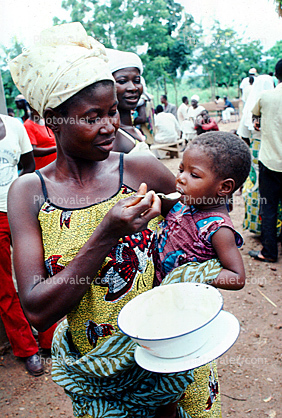 Mother Feeding a Child, Well Baby Clinic