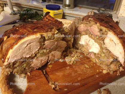 Three types of Meat mashed together as a roast, turkey stuffing