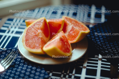 Grapefruit on a Plate, Sliced