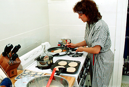 Stove, woman cooking, frying pan, knives, pancakes, breakfast, 1980s