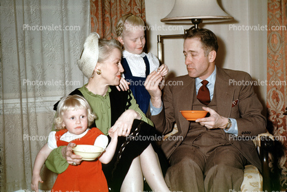 Noshing, girls, snaks, Table, plates, man, woman, 1950s
