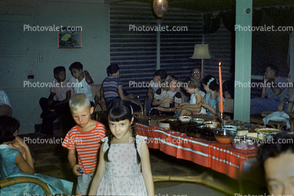 Table, plates, girl, boy, 1960s