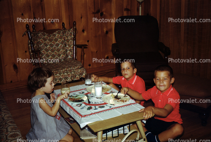 Eating in the Living Room, boy, girls, 1950s