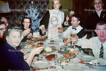 Wine Toast at Holiday Dinner, Hostess, Apron, Women, Men, couples, Mouth full, Table Cloth