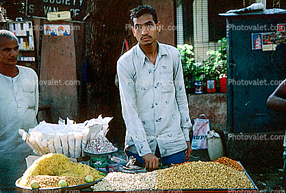 Man selling Legumes, beans, Mumbai
