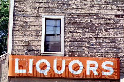 Liquors sign, neon, window, building