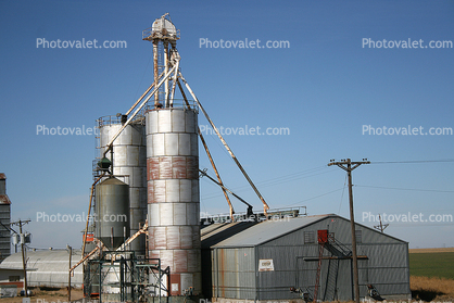 Silos, Quonset hut, grain elevator, west of Amarillo