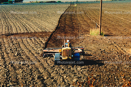 Harrow Disc Plow, Plowing, Tilling, Tractor, Rototill, Rotary-Till, Farmer, near Sacramento, California, USA, Dirt, soil
