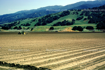 farmfields, mountains, hills, tractor, tilling, rototilling