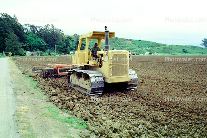 Harrow Disc Plow, Tilling the Soil, Tiller, Caterpillar Tractor, near Castroville, California