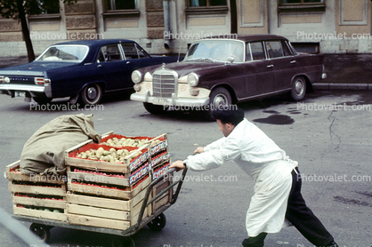 Man, Pushcart, car, vehicle, automobile, October 1969