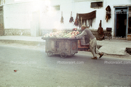 Pushcart, cart, man, building, street, Kabul, Afghanistan
