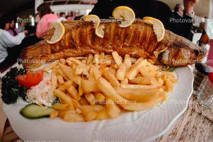 french fries, fish, plate, lemons, pickle, cooked food, deep-fried