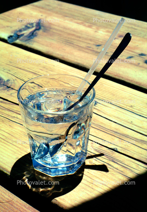 Glass of Water, straw, spoon, shadow
