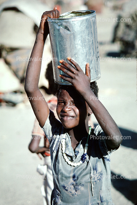 Boy with Water Bucket, Refugee Camp, Somalia