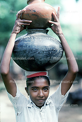 Girl With Water Jugs on her Head, Child Labor