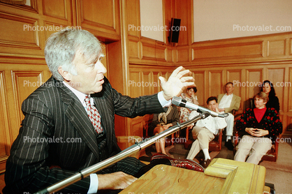 Defendant, witness, jury, witness stand, male, businessman, man, microphone, person, Pinstripe Suit, tie, Juror, People, talking, speaking, gestures, court session, trial