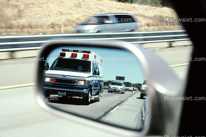Ambulance in Mirror, flashing lights