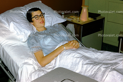 Woman Patient, Hospital Room, Bed, Pillow, 1950s