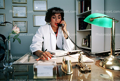 Female Doctor on the phone