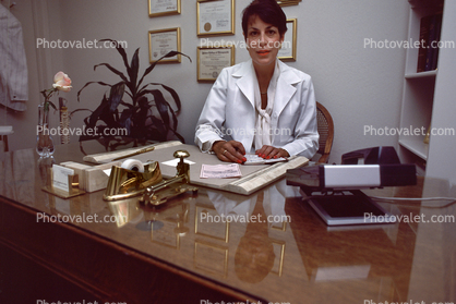 Woman Doctor at her Desk