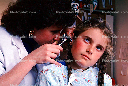 Doctor and girl patient, ear examination, otoscope, ear scope, Female, Woman